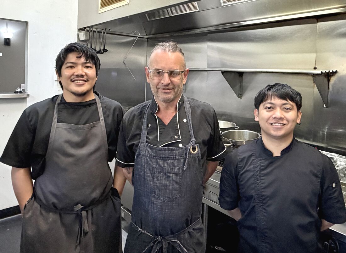 Executive Chef Dean with two of the Dooleys chefs in the Springsure kitchen