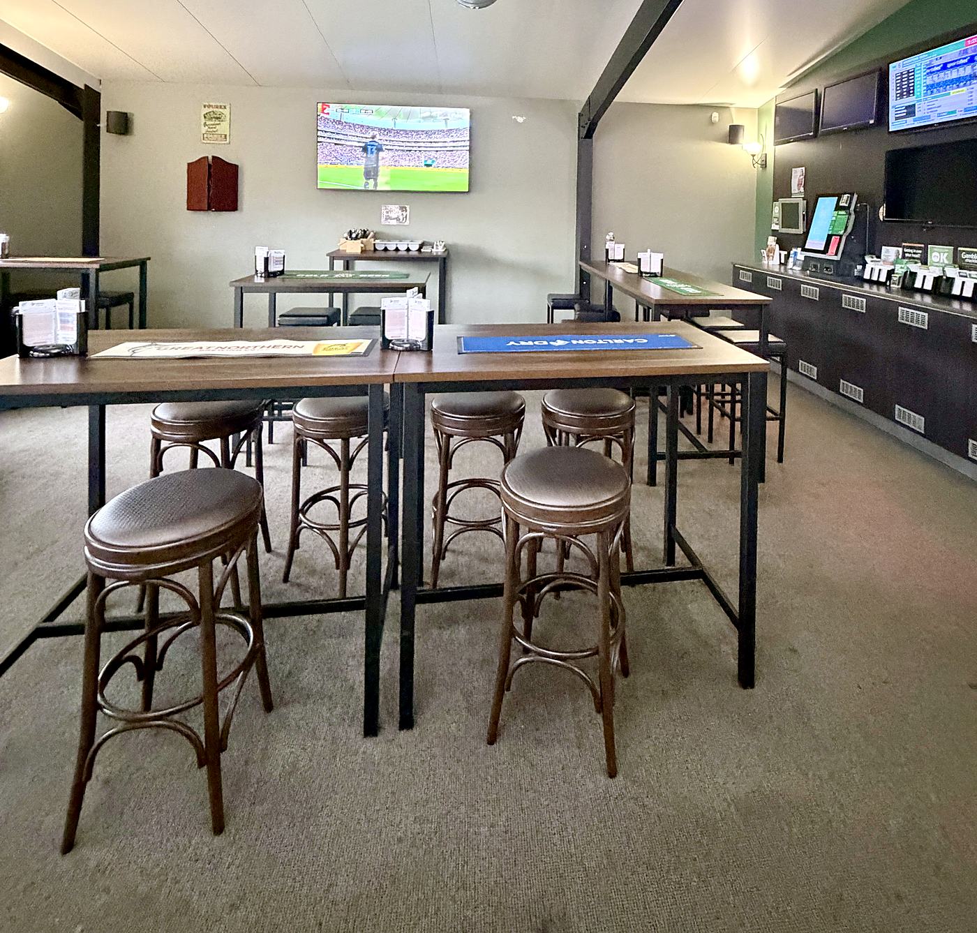 Bar tables and screens in the Tavern