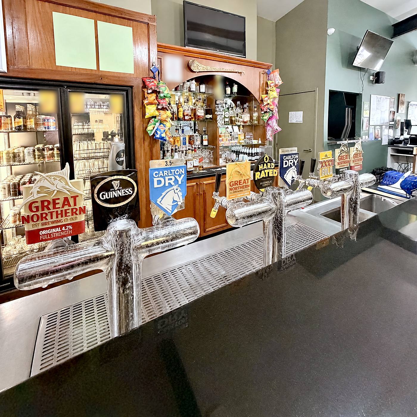 Beer taps along the Tavern bar